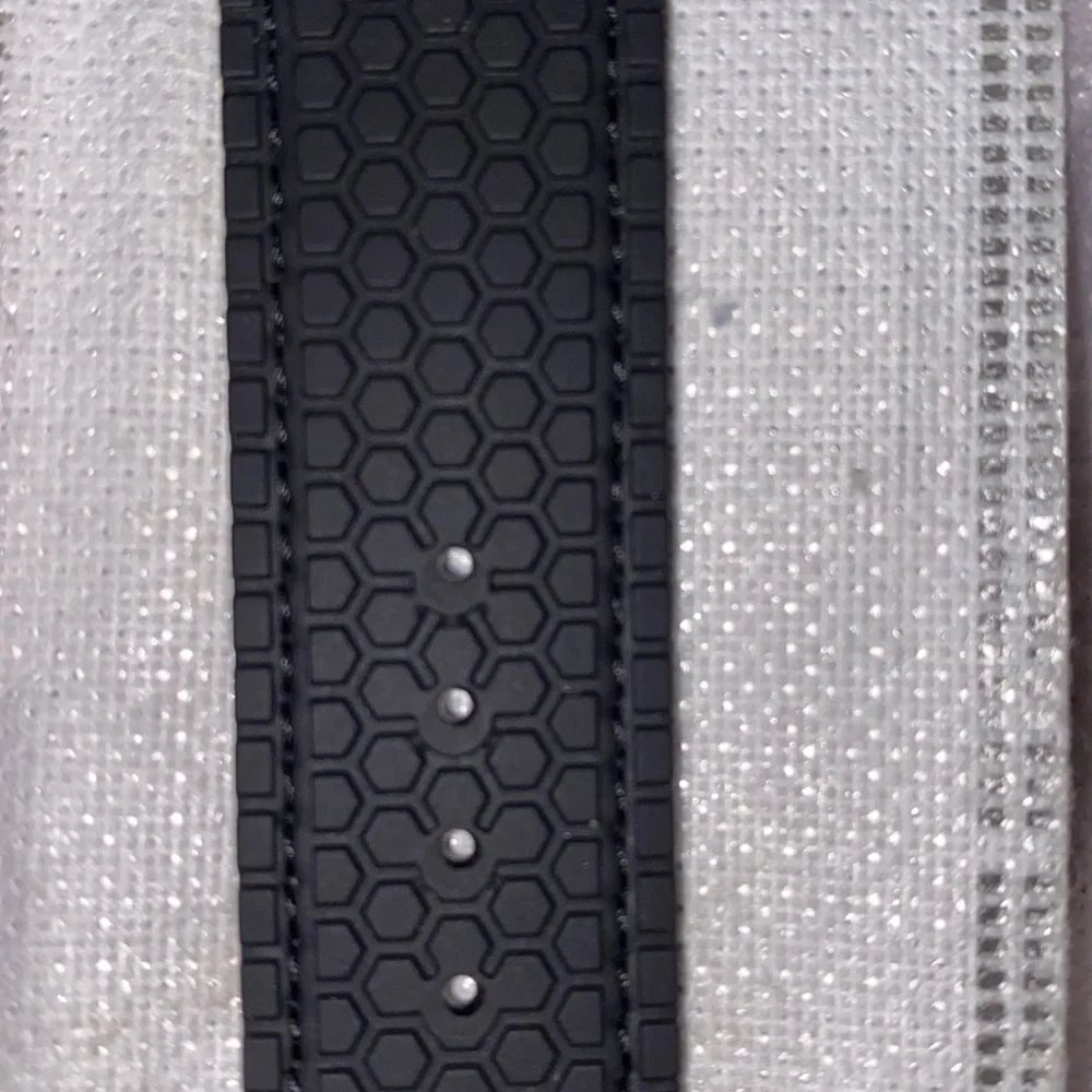 NWT a Apple Watch band black reversible leather side& other is like tire tracks
